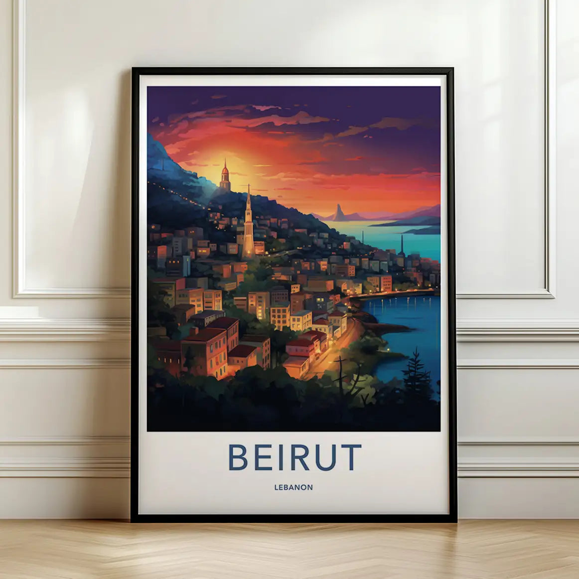 Framed travel poster of Beirut's illuminated cityscape and coastline at sunset leaning against a white wall.