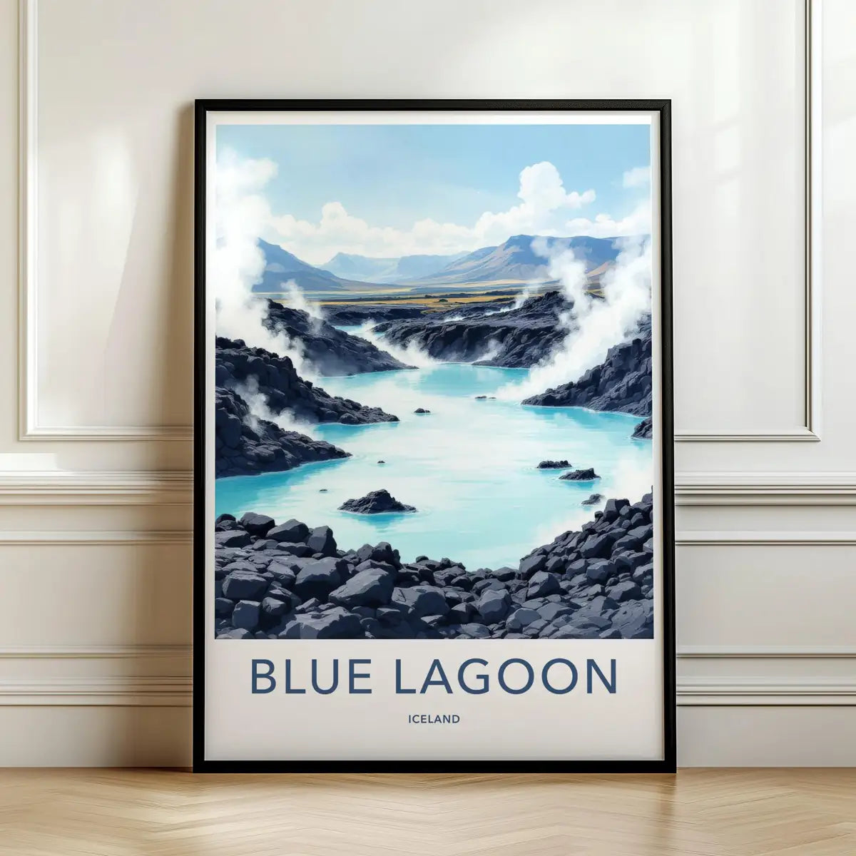 Framed travel poster of the steaming Blue Lagoon and rugged volcanic rocks leaning against a white wall.