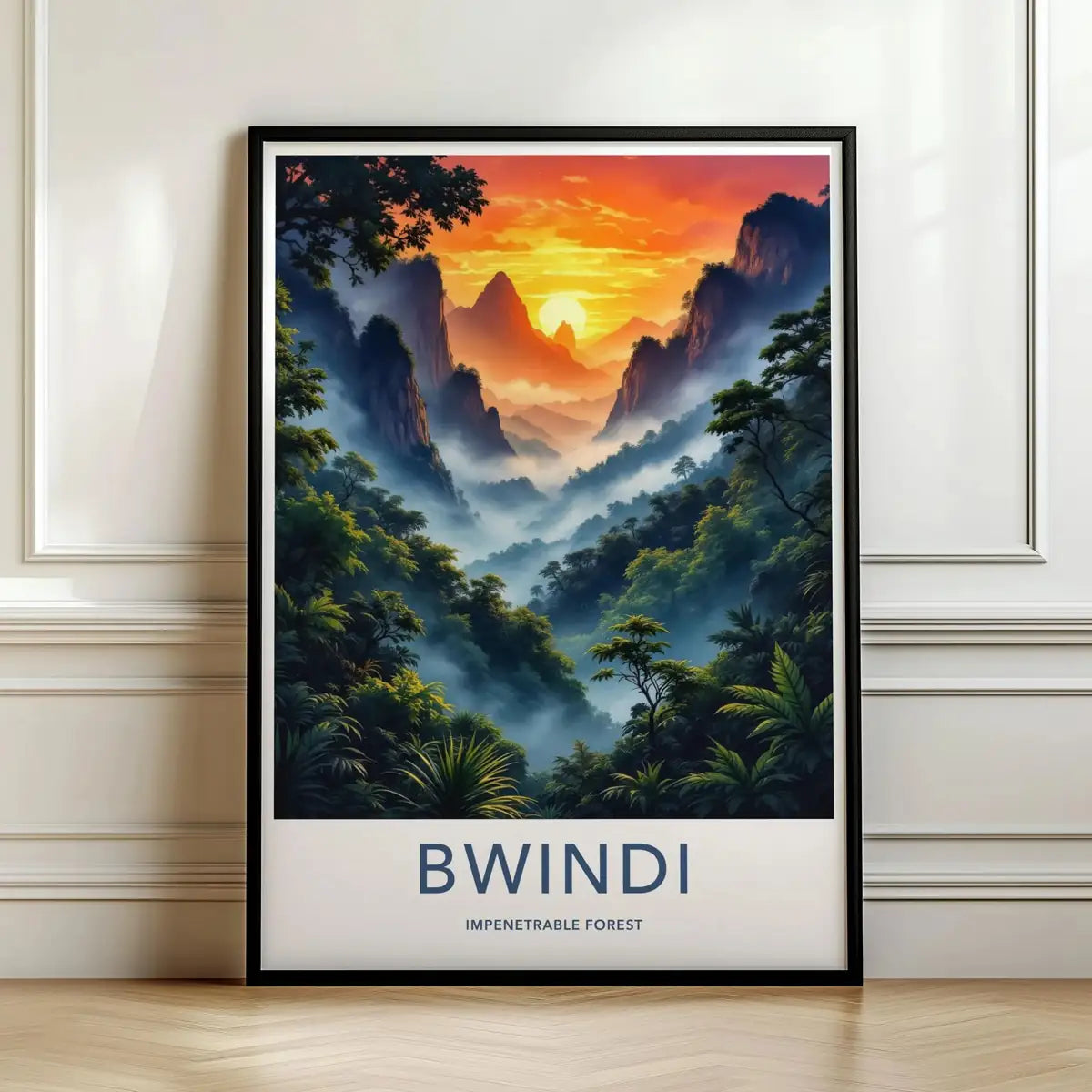 Framed travel poster of Bwindi's misty, green jungle mountains at sunrise leaning against a white wall.