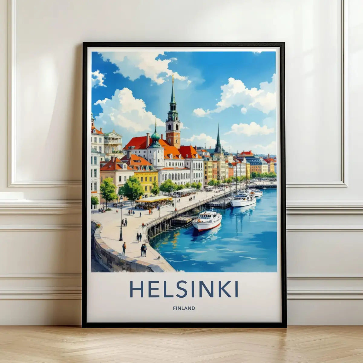 Framed travel poster of Helsinki's white coastal cathedral and harbor leaning against a white wall.