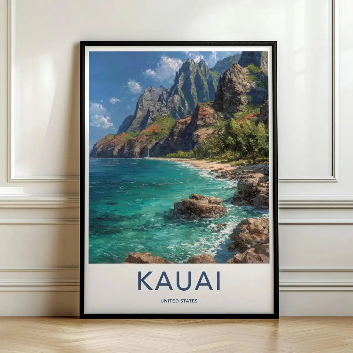Framed travel poster of Kauai's lush green coastal cliffs and sandy beach leaning against a white wall.
