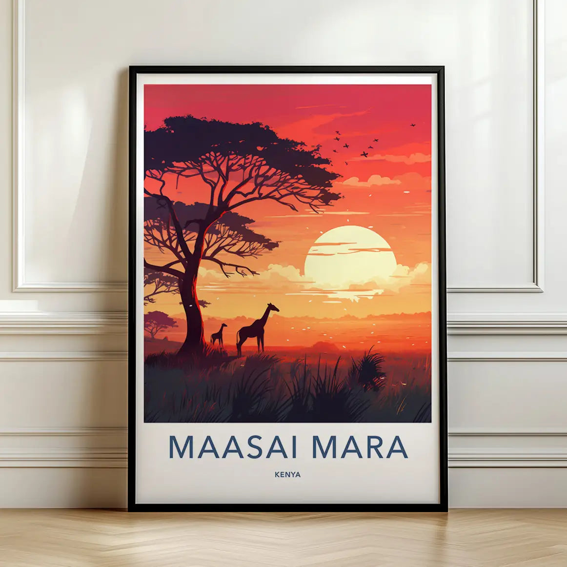 Framed travel poster of the Maasai Mara with silhouetted giraffes and an acacia tree at sunset leaning against a white wall.