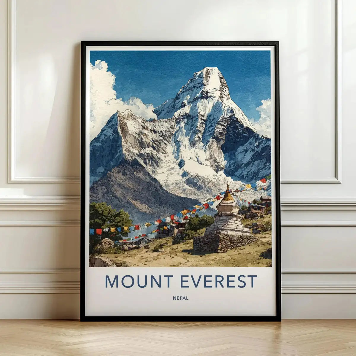 Framed travel poster of Mount Everest's snow-capped peak and colorful prayer flags leaning against a white wall.