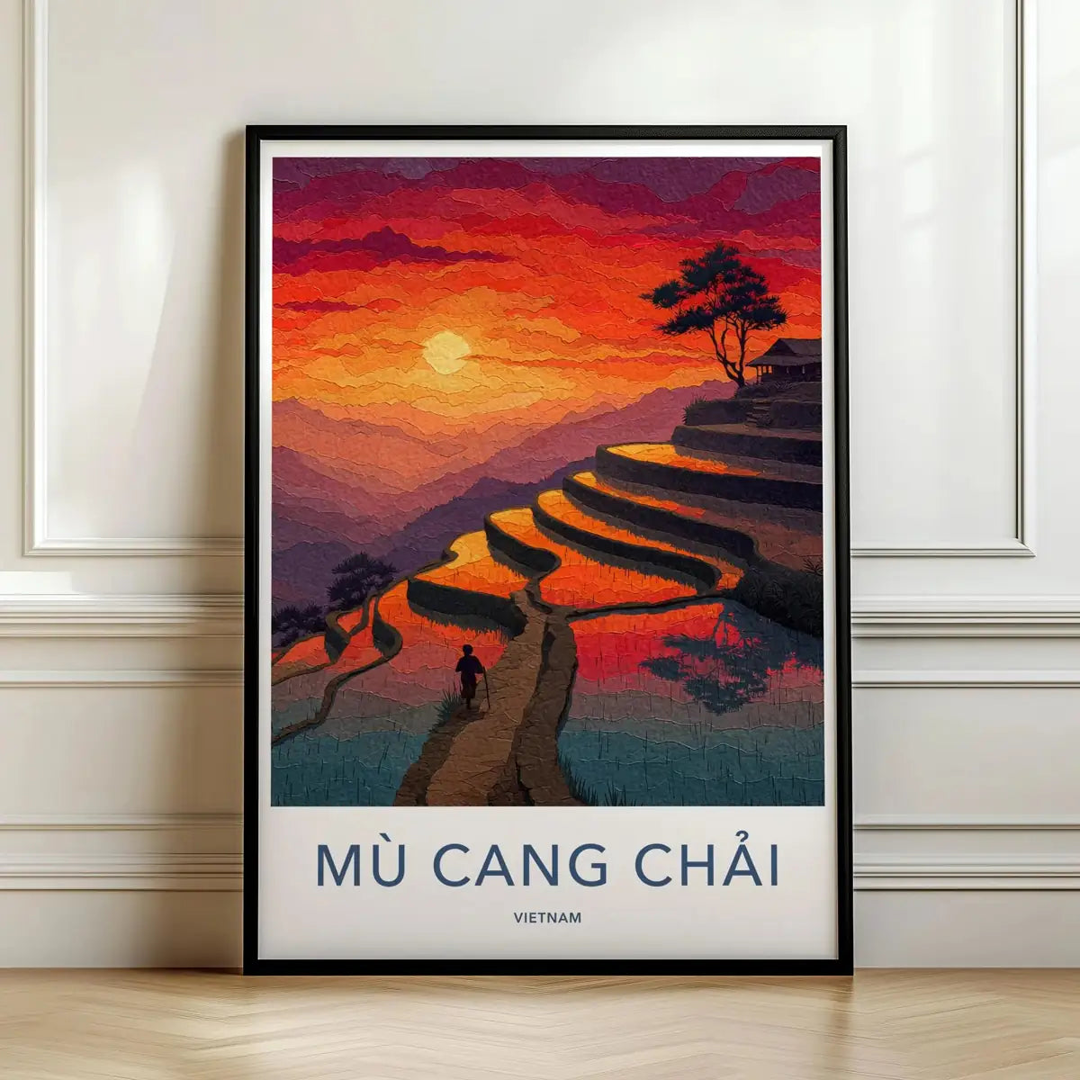 Framed travel poster of Mu Cang Chai's golden terraced rice fields at sunset leaning against a white wall.