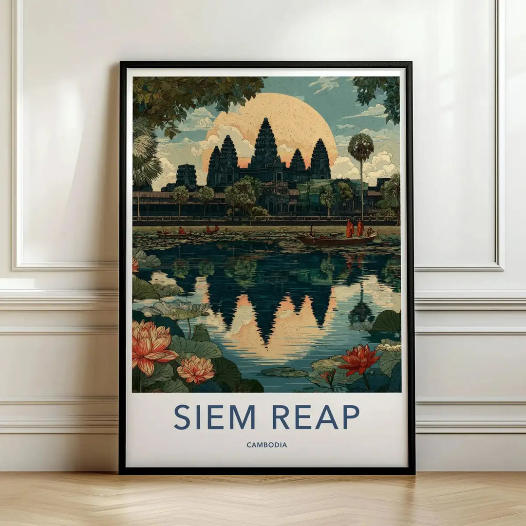 Framed travel poster of the ancient Angkor Wat temple ruins at sunrise leaning against a white wall.