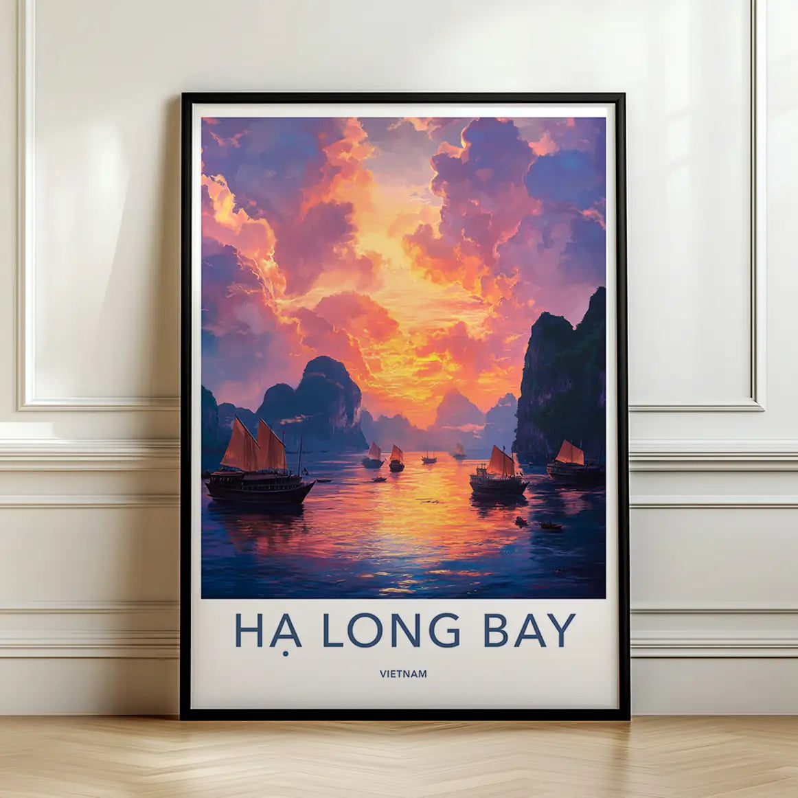 Framed poster of Ha Long Bay with sailboats and a colorful sunset.