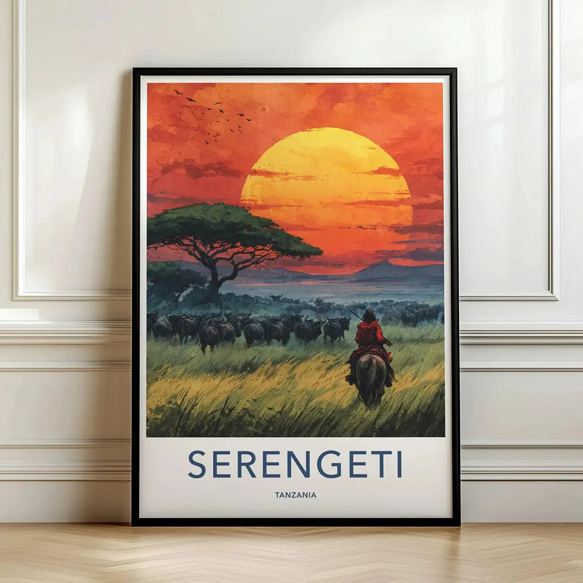 Framed artwork of a Serengeti landscape with a sunset and a person on horseback.