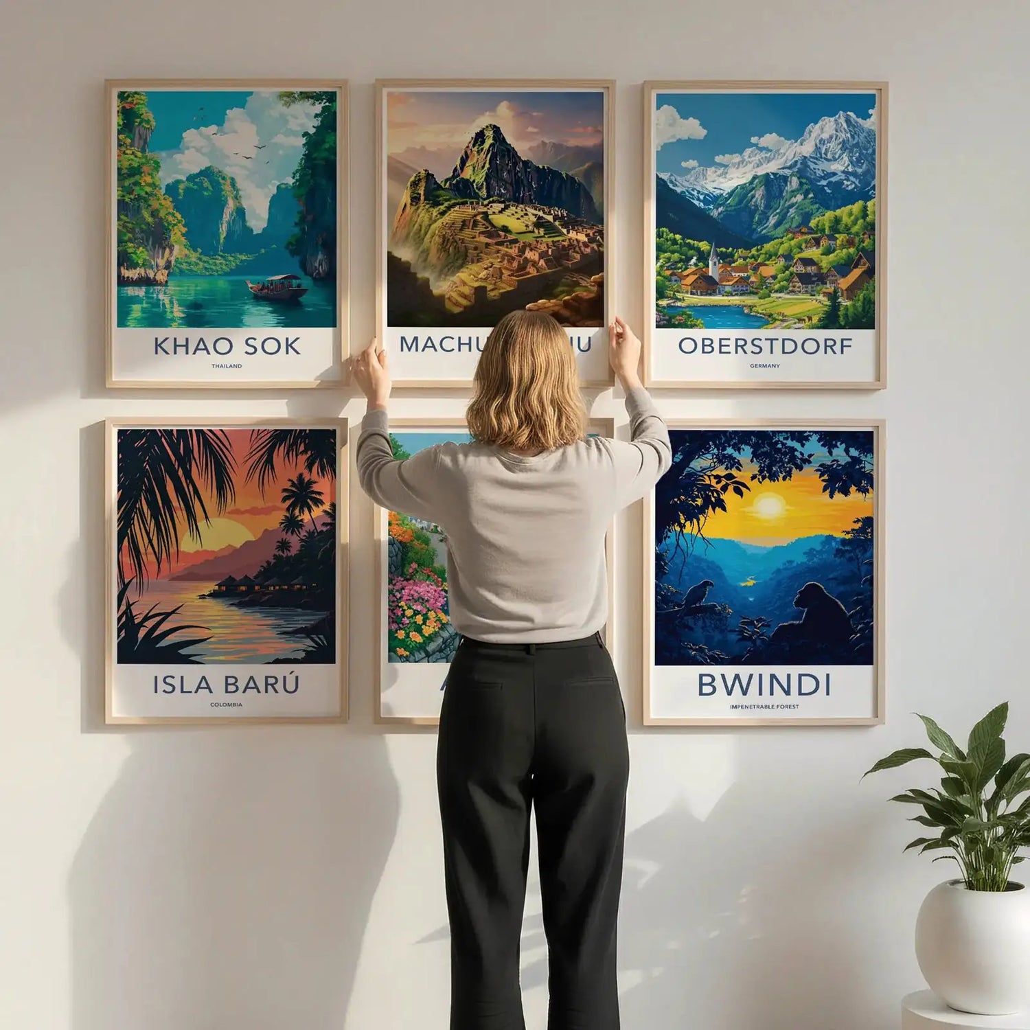 A curated gallery wall featuring six different nature and city travel posters.